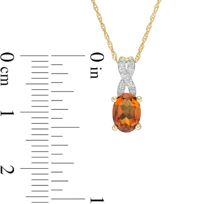 Oval Madeira Citrine and 0.05 CT. T.W. Natural Diamond X" Drop Pendant in 10K Yellow Gold"