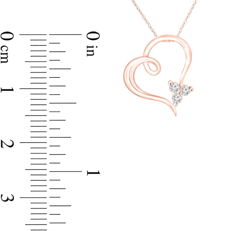 0.07 CT. T.W. Natural Diamond Trio Swirl Tilted Heart Outline Pendant in 10K Rose Gold