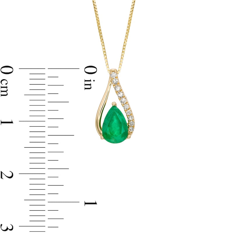 Pear-Shaped Emerald and 0.05 CT. T.W. Natural Diamond Teardrop Pendant in 10K Yellow Gold