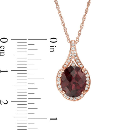 Oval Garnet and 0.17 CT. T.W. Natural Diamond Frame Teardrop Pendant in 10K Rose Gold