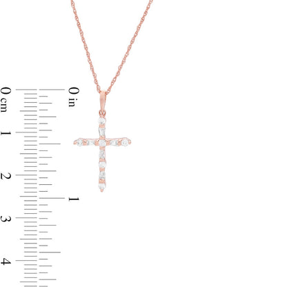 0.2 CT. T.W. Baguette and Round Natural Diamond Cross Pendant in 10K Rose Gold