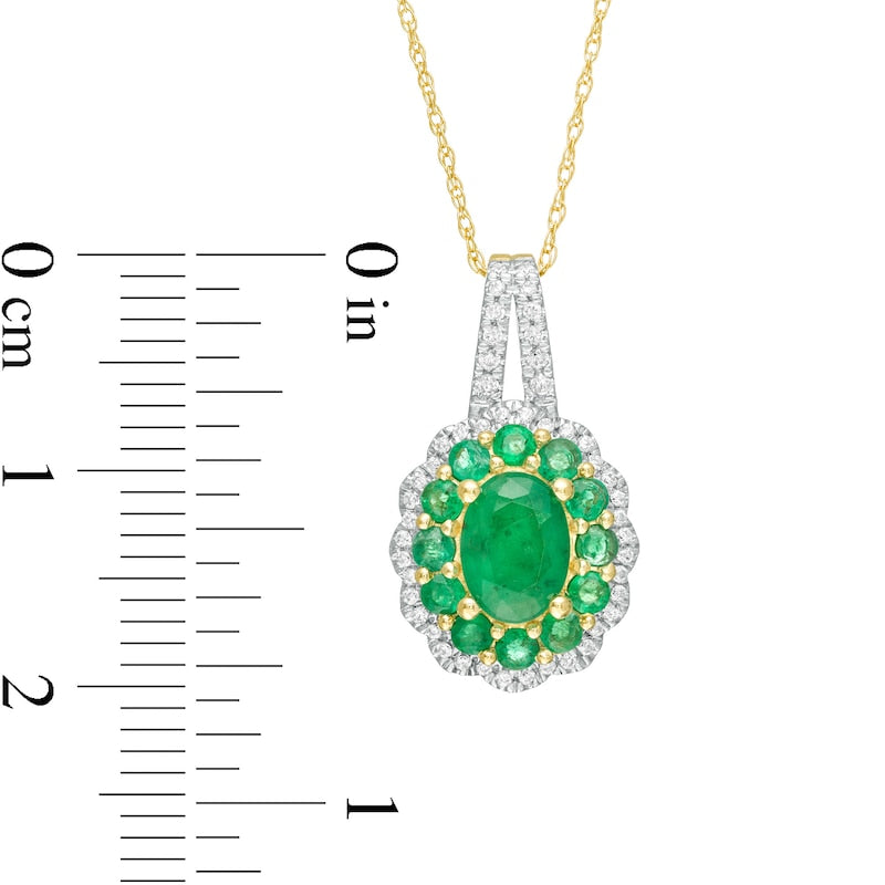 Oval Emerald and 0.17 CT. T.W. Natural Diamond Double Scallop Frame Pendant in 10K Yellow Gold