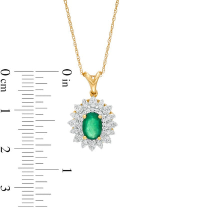Oval Emerald and 0.2 CT. T.W. Natural Diamond Flower Frame Pendant in 10K Yellow Gold