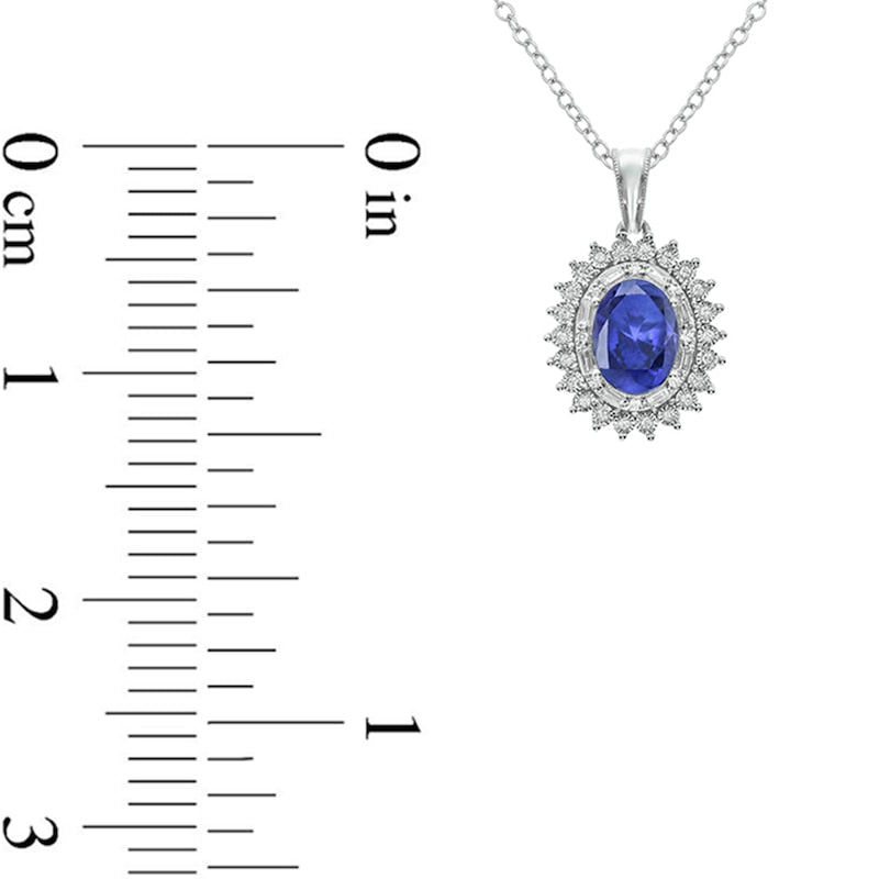 Oval Lab-Created Blue Sapphire and 0.13 CT. T.W. Diamond Starburst Double Frame Drop Pendant in Sterling Silver