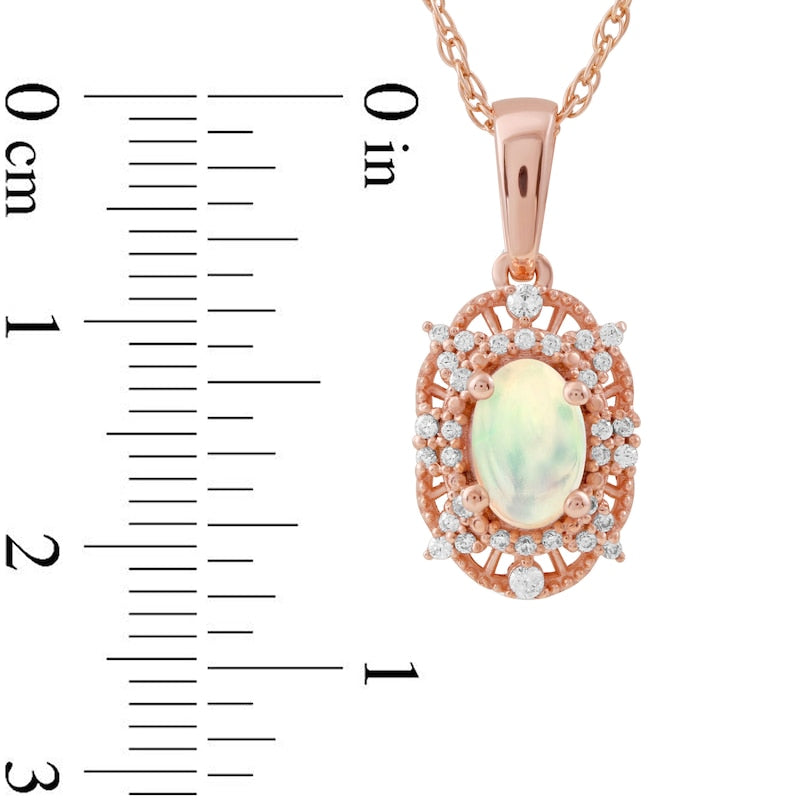 Oval Opal and 0.1 CT. T.W. Natural Diamond Bead Frame Sunburst Pendant in 10K Rose Gold