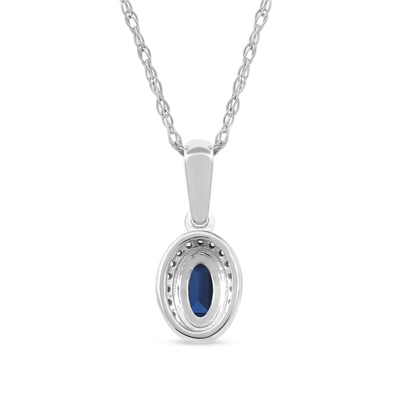 Oval Blue Sapphire and 0.05 CT. T.W. Natural Diamond Framed Antique Vintage-Style Drop Pendant in 10K White Gold