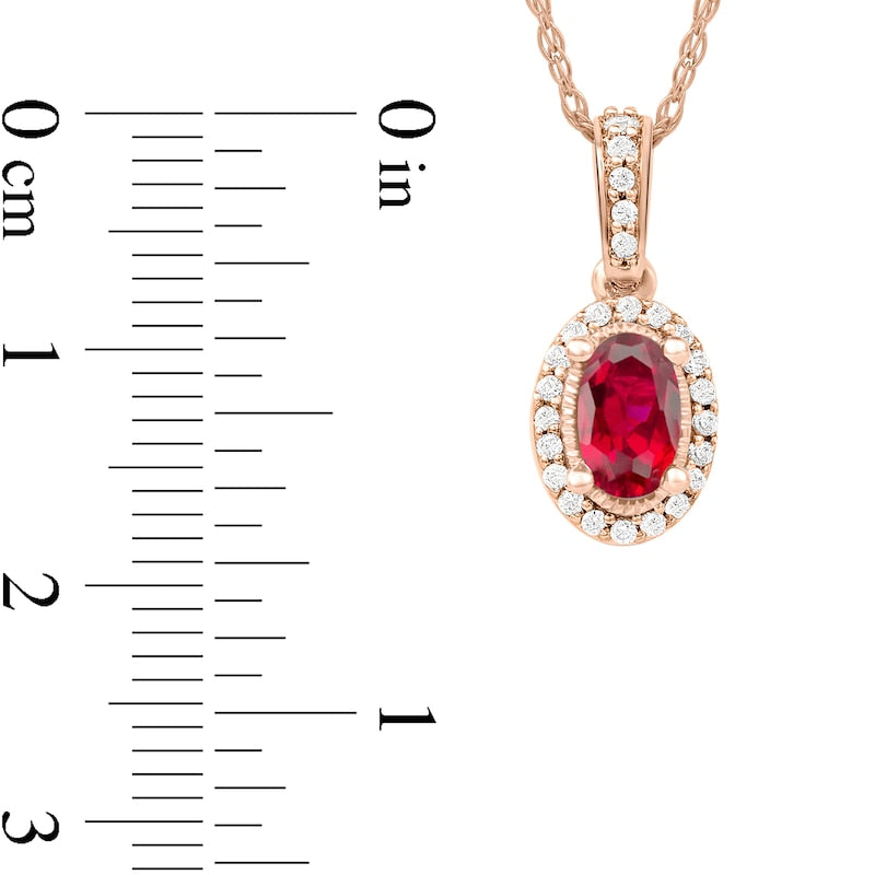 Oval Ruby and 0.05 CT. T.W. Natural Diamond Framed Antique Vintage-Style Drop Pendant in 10K Rose Gold