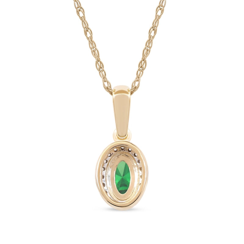 Oval Emerald and 0.05 CT. T.W. Natural Diamond Framed Antique Vintage-Style Drop Pendant in 10K Yellow Gold