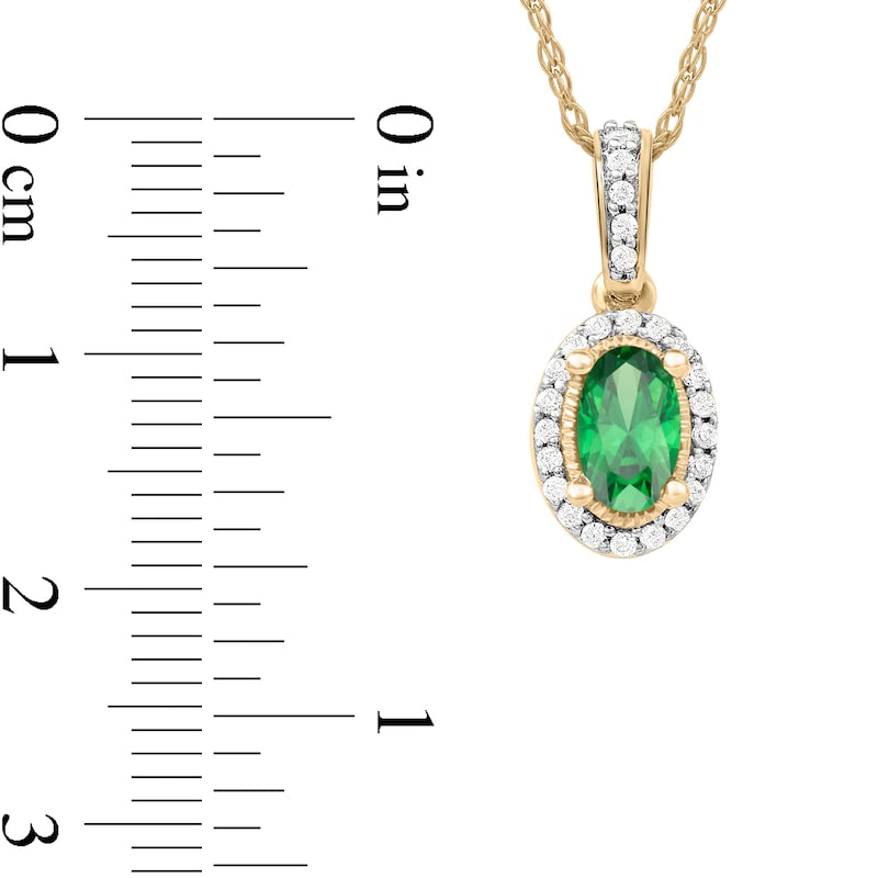 Oval Emerald and 0.05 CT. T.W. Natural Diamond Framed Antique Vintage-Style Drop Pendant in 10K Yellow Gold