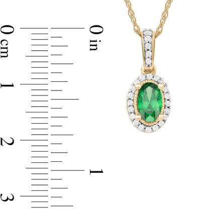 Oval Emerald and 0.05 CT. T.W. Natural Diamond Framed Antique Vintage-Style Drop Pendant in 10K Yellow Gold