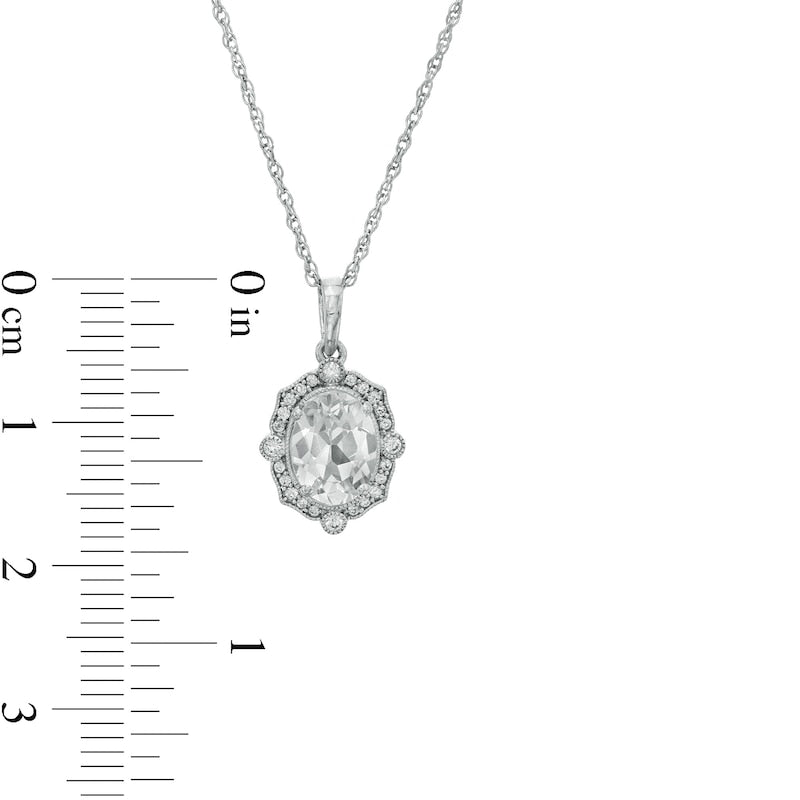 Oval White Lab-Created Sapphire and 0.1 CT. T.W. Diamond Ornate Frame Antique Vintage-Style Pendant in 10K White Gold