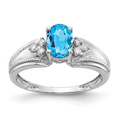 14k White Gold 7x5mm Oval Blue Topaz A Real Diamond ring
