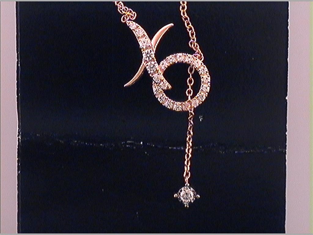 10k Rose Gold Round Diamond XO Love Fashion Necklace 1/5 Ctw